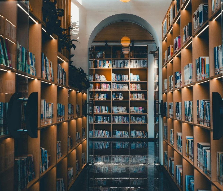 Student reading academic handbook